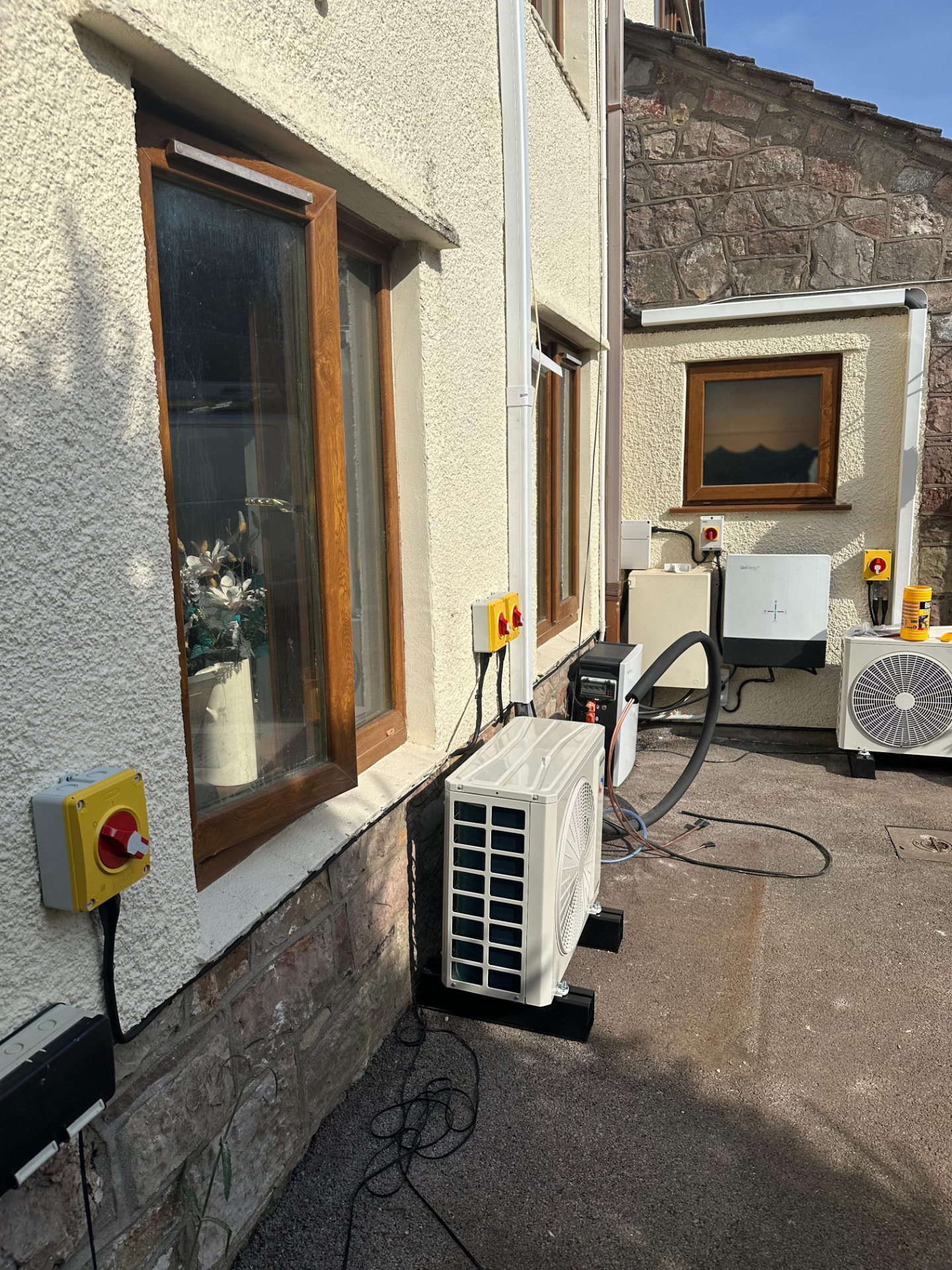External air conditioning condenser unit with dedicated fused electrical isolator supply